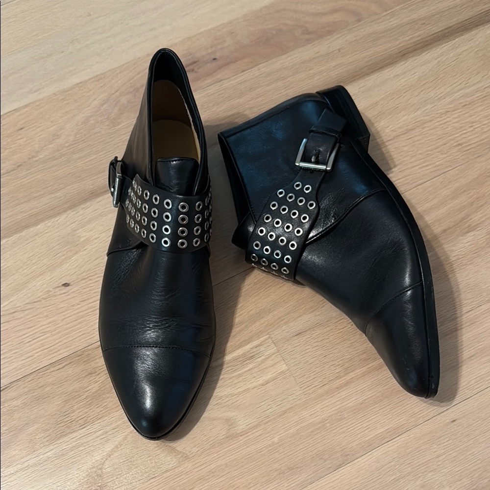 Michael Kors Black Leather Ankle Boots Featuring Silver Grommets